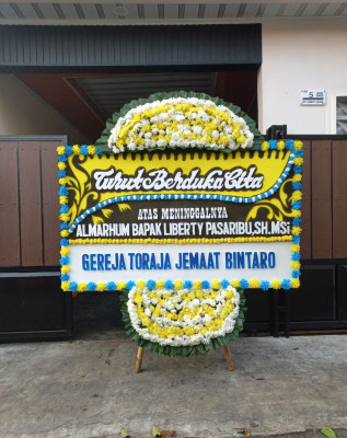 Papan Bunga Duka di Kelumpang Barat